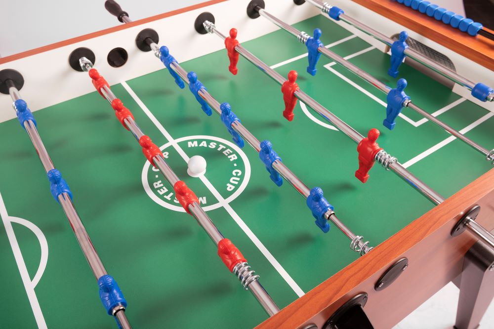 Tischkicker Master Cup DELUXE_indoor_sport safety_teleskop_SA_tischfussball_tischkicker24_spielfledecken_nahtlos